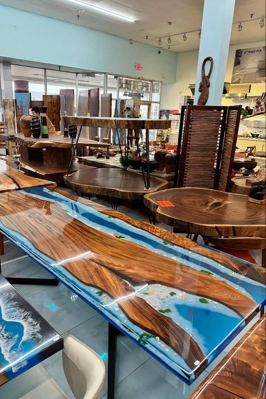 Wooden table with blue resin finish in a furniture store
